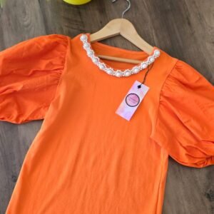 GIRL ORANGE TOP WITH PEARLS