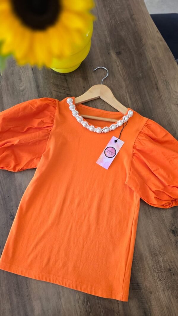 GIRL ORANGE TOP WITH PEARLS