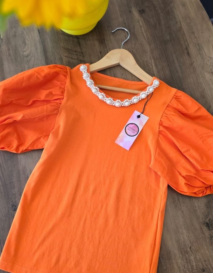 GIRL ORANGE TOP WITH PEARLS